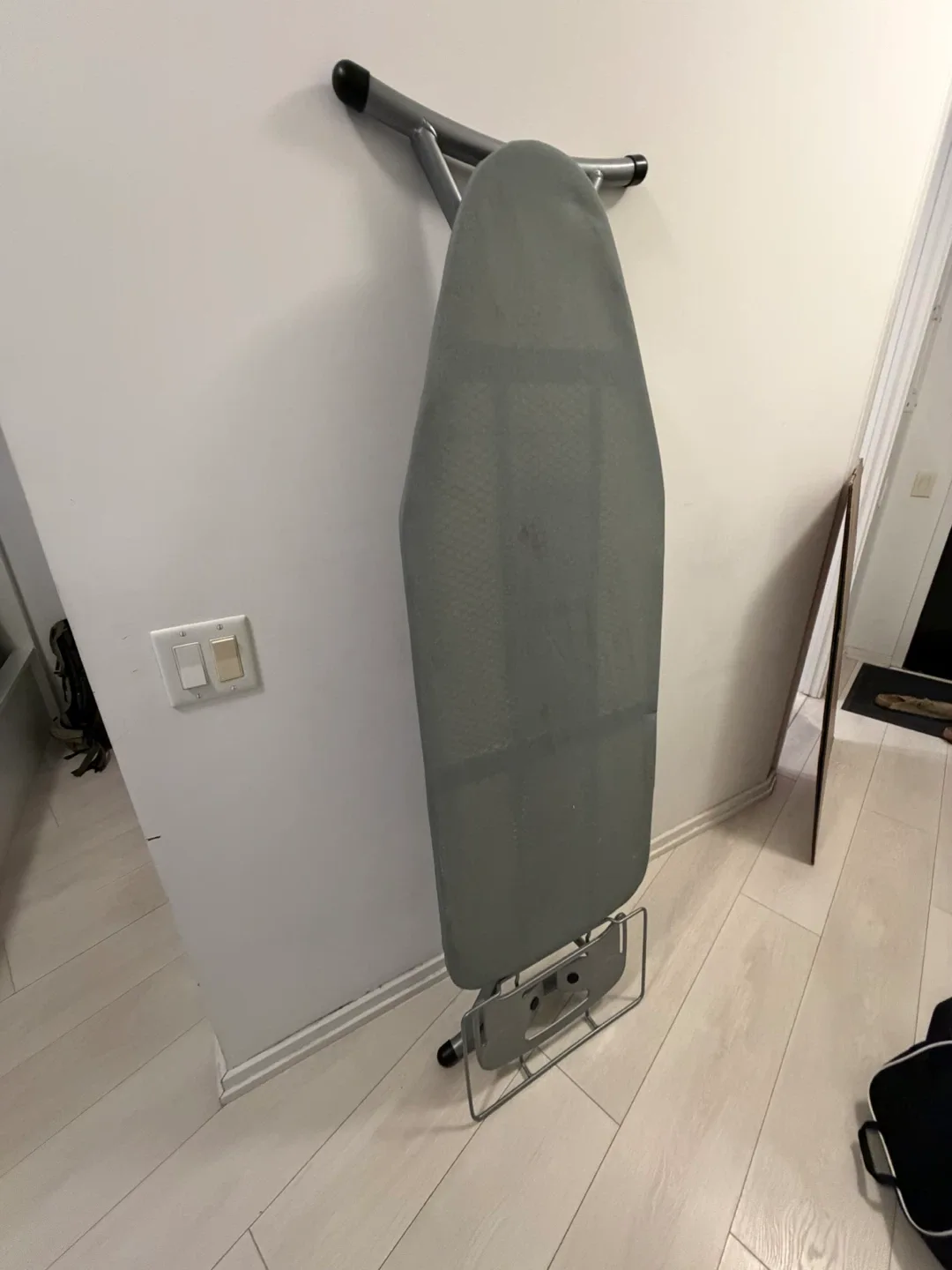 Wall-mounted ironing board