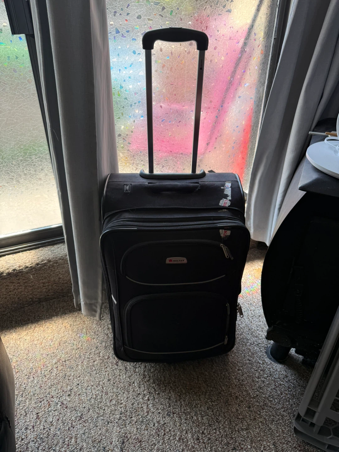Delsey Black Rolling Luggage