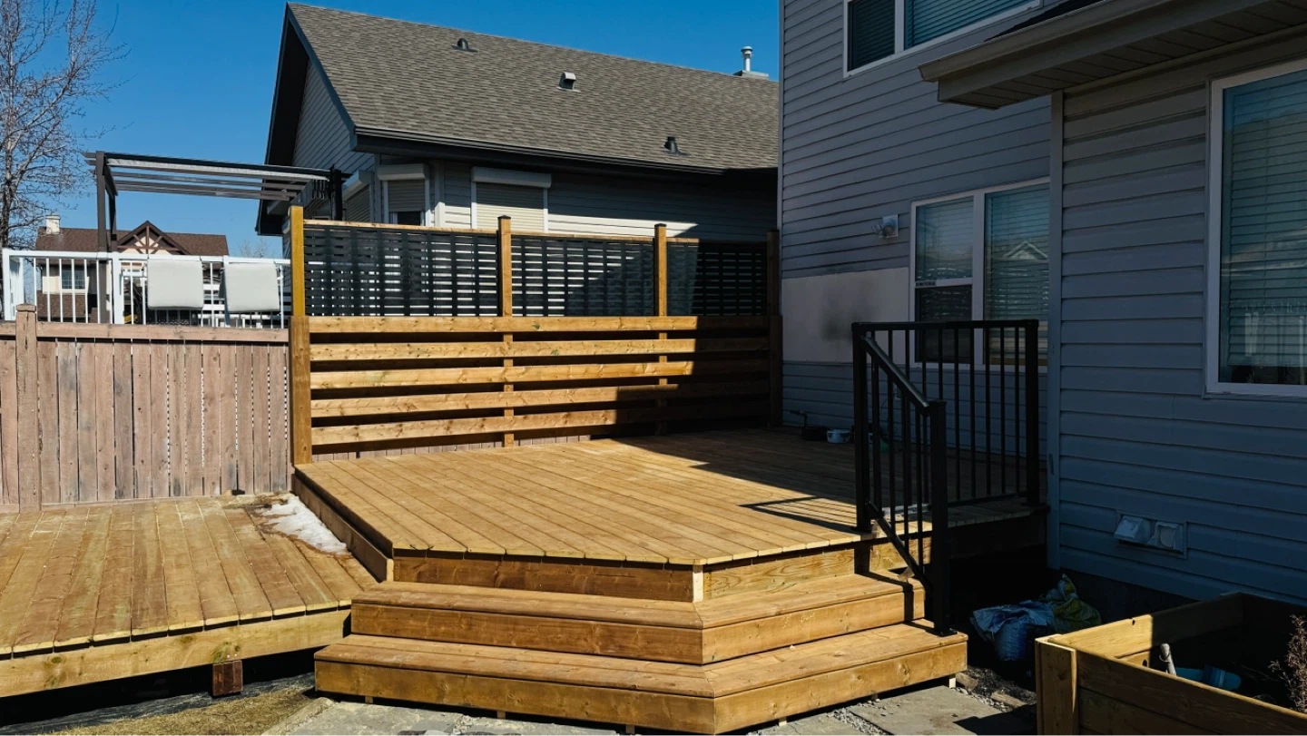Wooden Deck with Railings and Privacy Screen