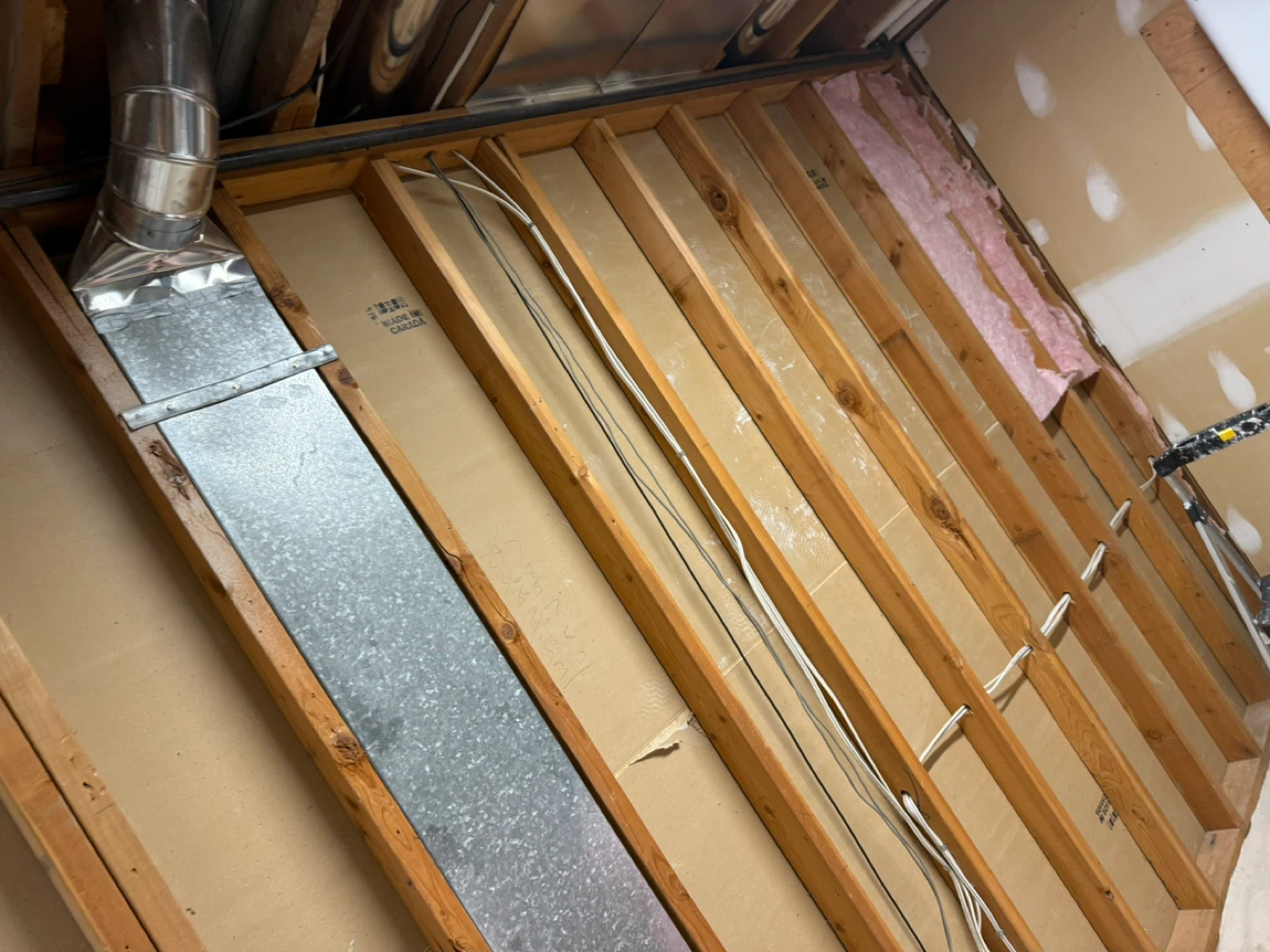 Unfinished Basement Wall with Drywall and Framing - photo 4