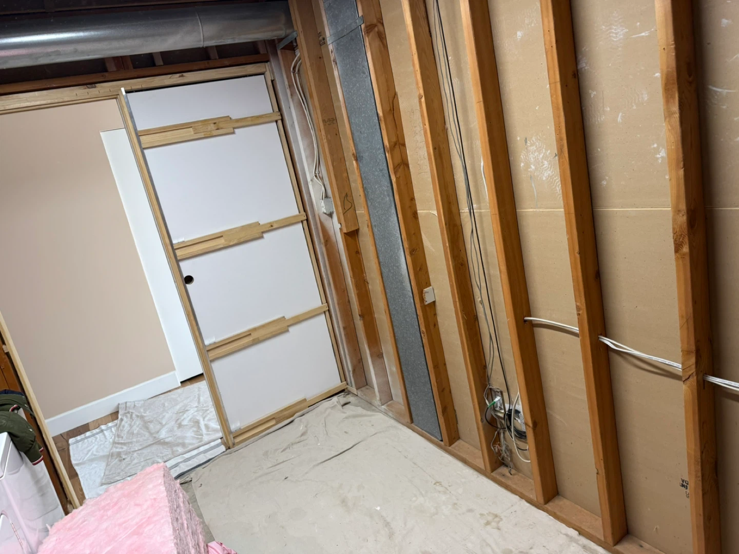Unfinished Basement Wall with Drywall and Framing