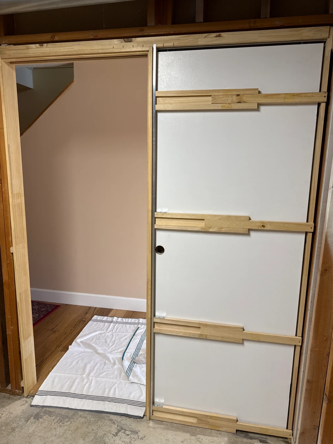 Unfinished Basement Wall with Drywall and Framing - photo 5