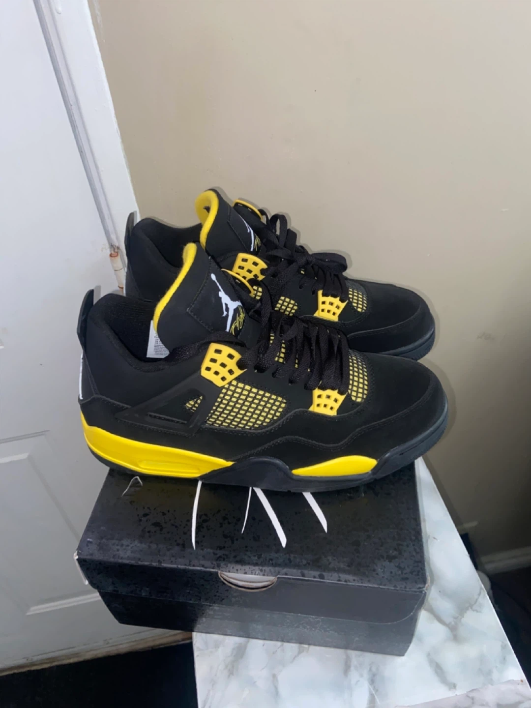 Air Jordan 4 'Lightning' Black Yellow