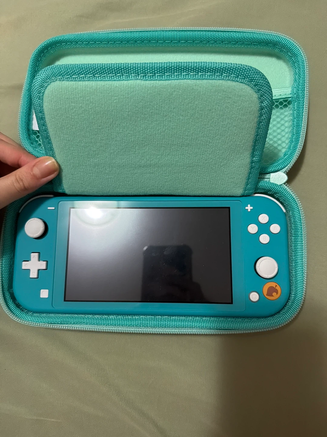Nintendo Switch Lite (Turquoise) with Minecraft Games and Case