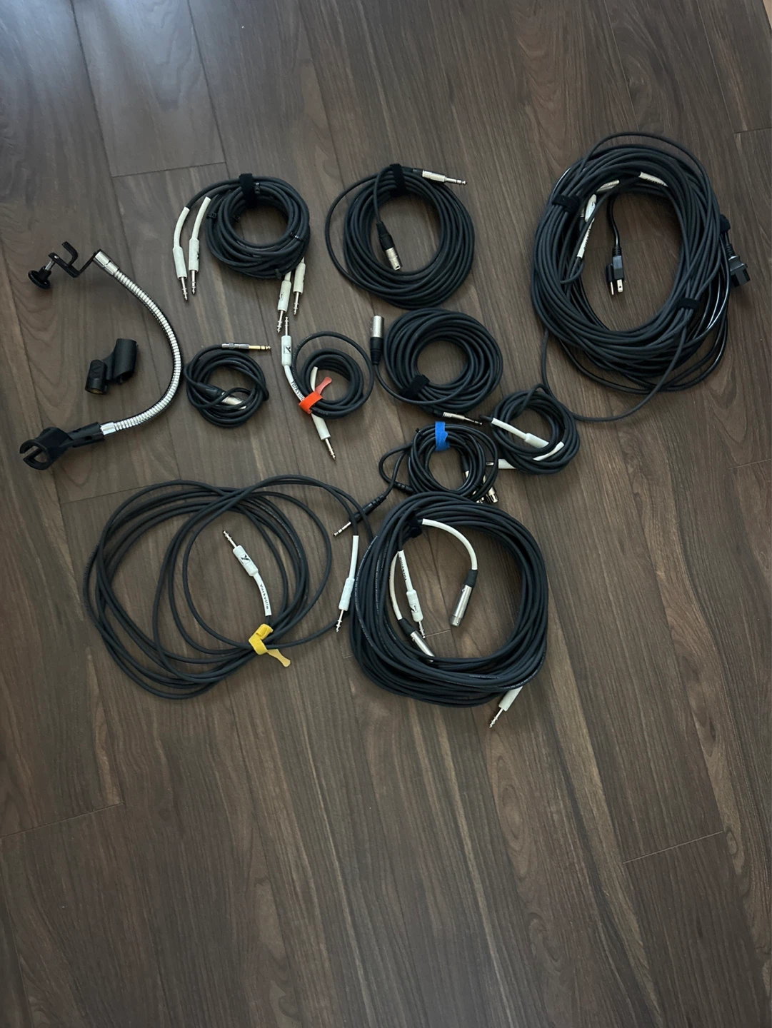Assorted Audio Cables and Microphone Stand Accessories