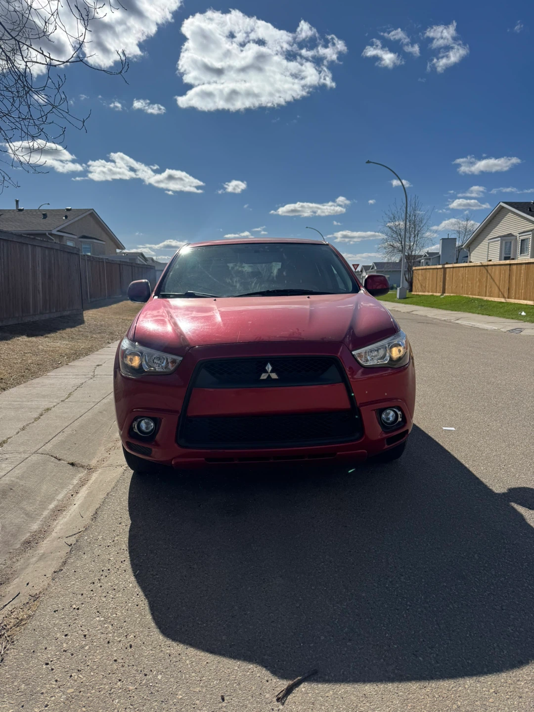 Red Mitsubishi RVR SUV