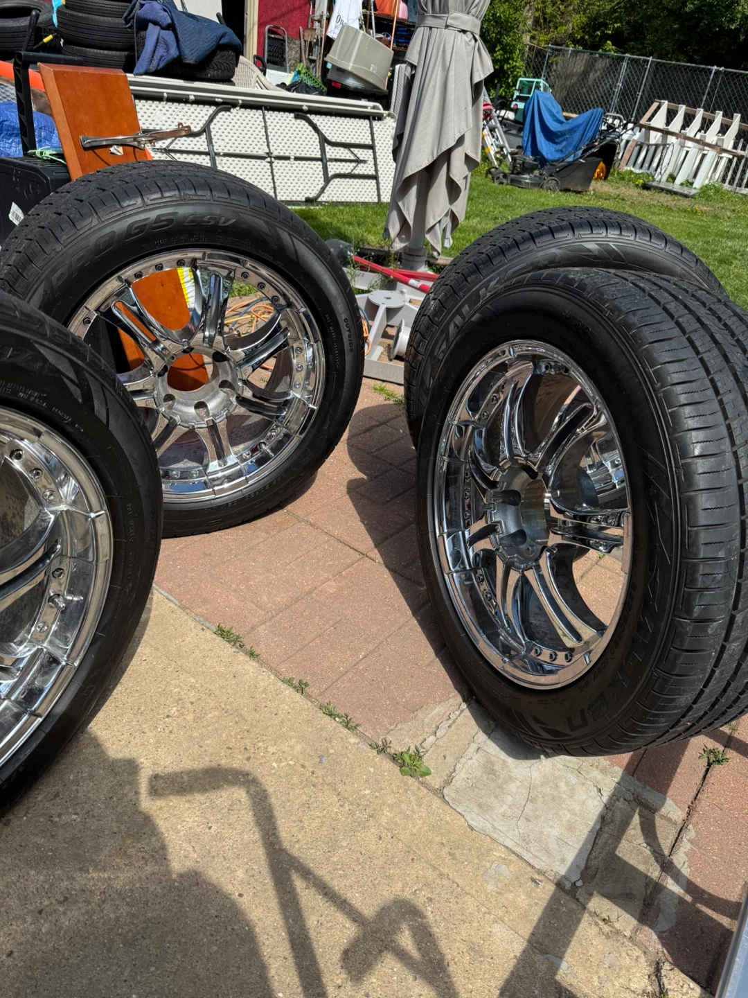 Set of 4 Chrome Rims with Tires - photo 3