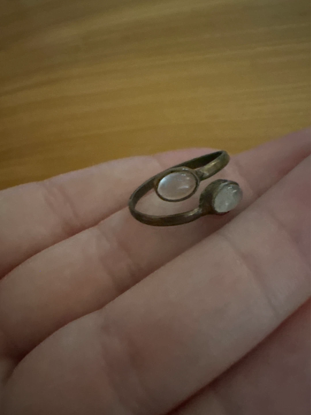 Bronze tone ring with two rose quartz