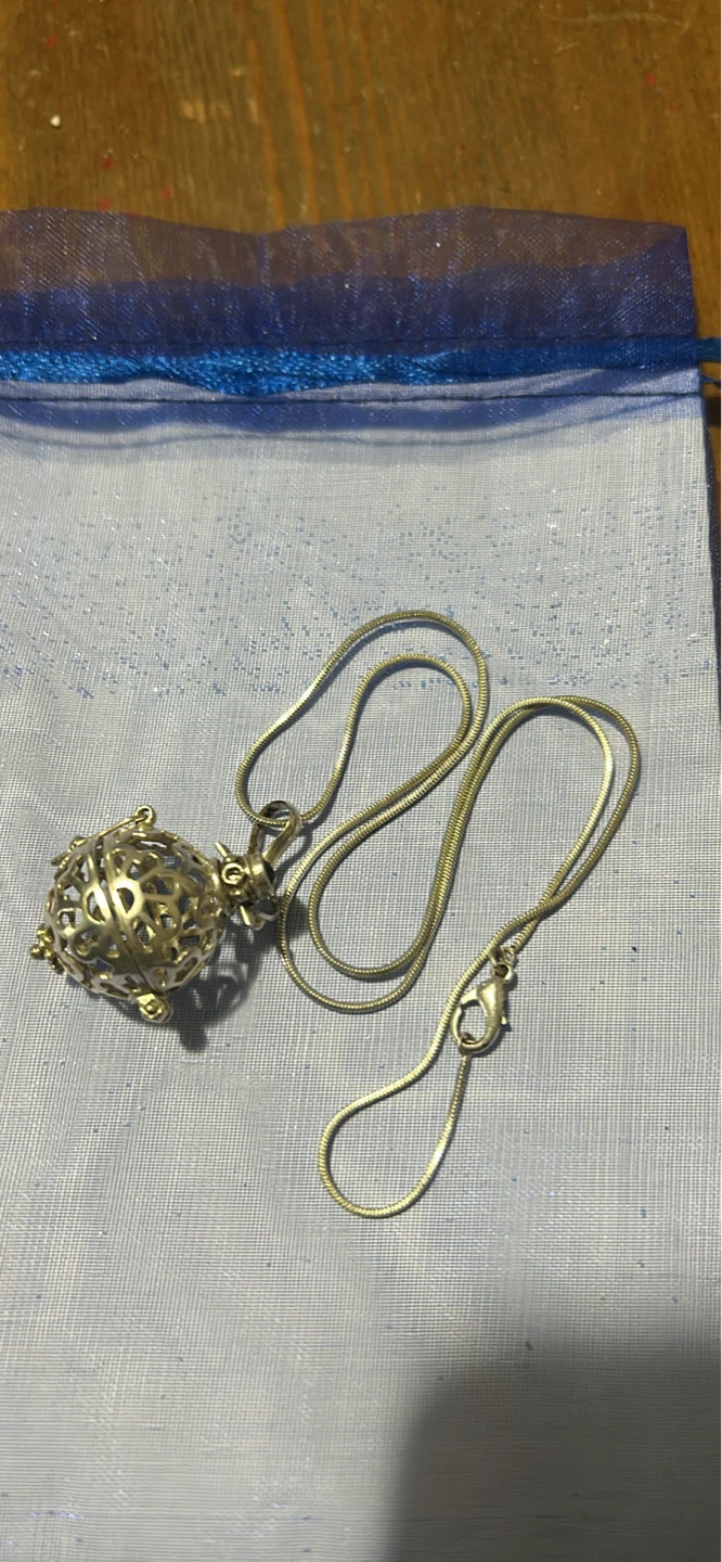 Beautiful 725 silver filigree ball locket and chain