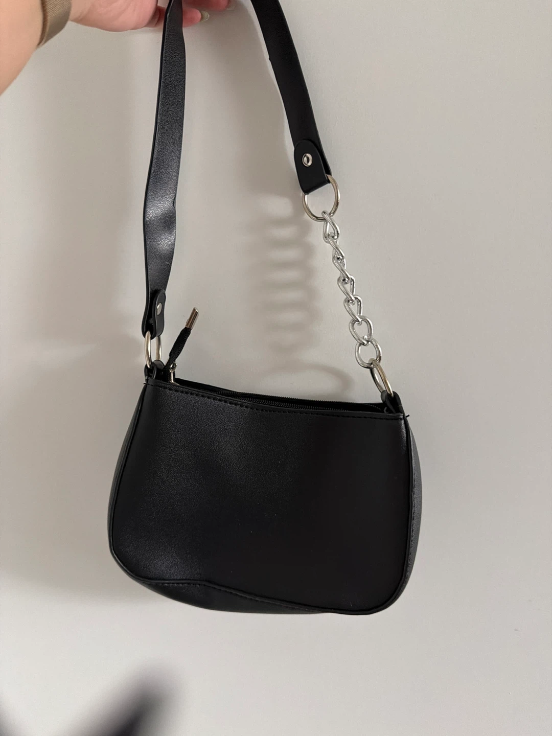 Black shoulder bag with chain detail