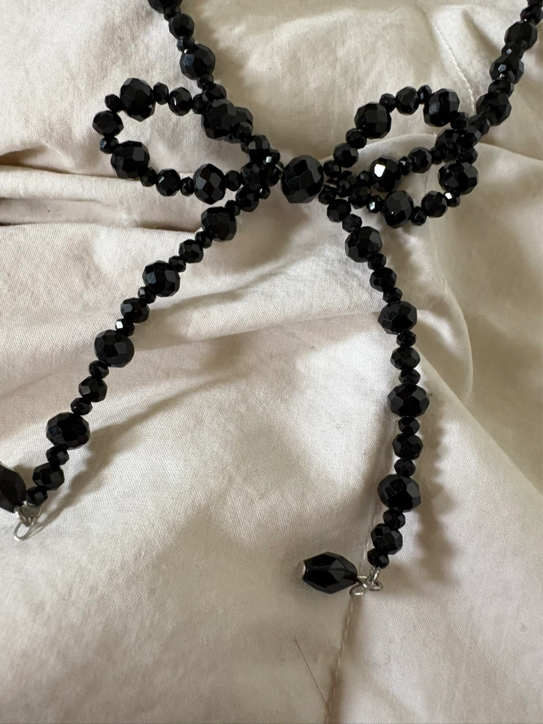 Black Beaded Bow Necklace from urban outfitters