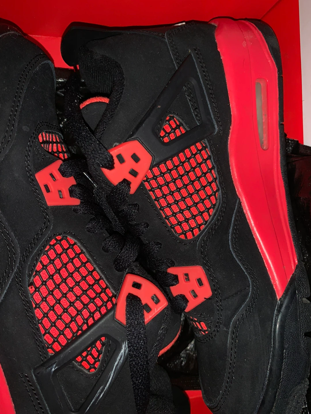 Air Jordan 4 "Red Thunder" Sneakers