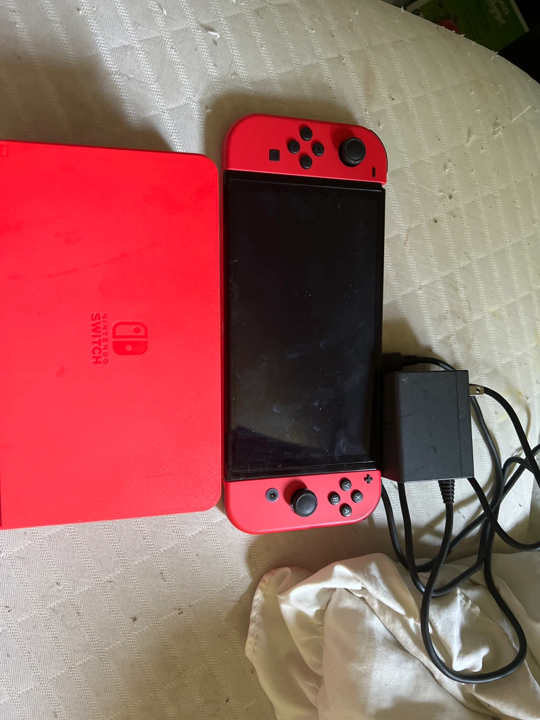 Red Nintendo Switch Console with Charger