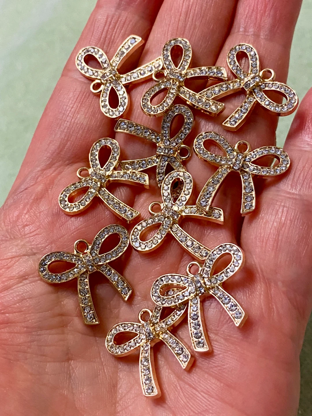 Set of 10 Gold Bow Charms with Rhinestones