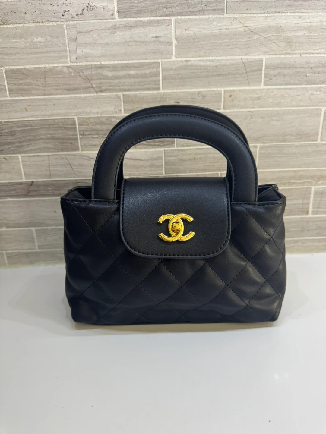 Black Quilted Top Handle Bag with Chain Strap