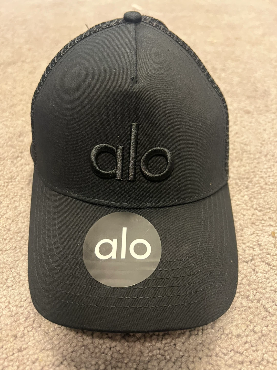 Alo Black Trucker Hat unisex