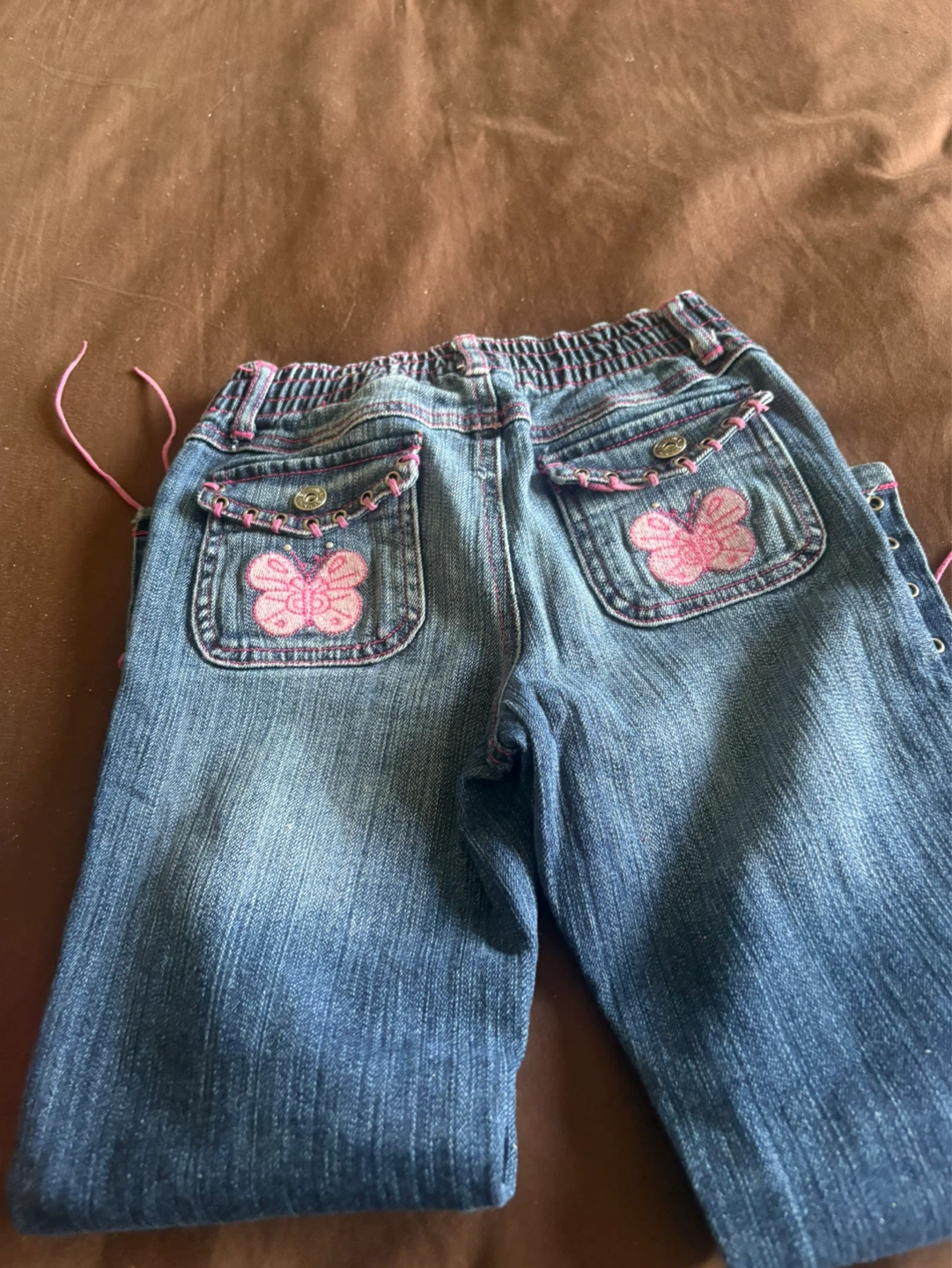 Girl's Blue Denim Jeans with Pink Lacing and Butterfly Pockets