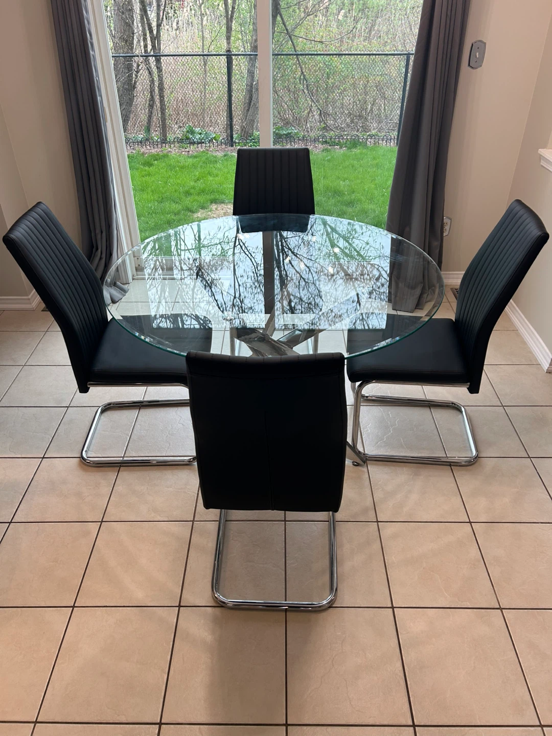Glass Dining Table with 4 Black Chairs