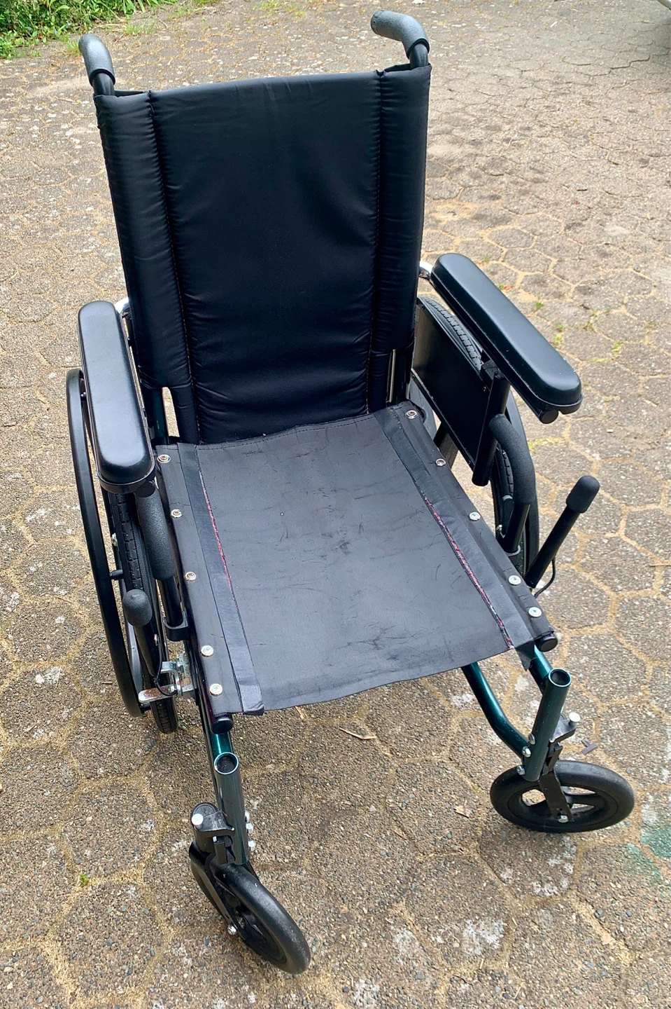 Wheelchairs (three standard plus one small).
