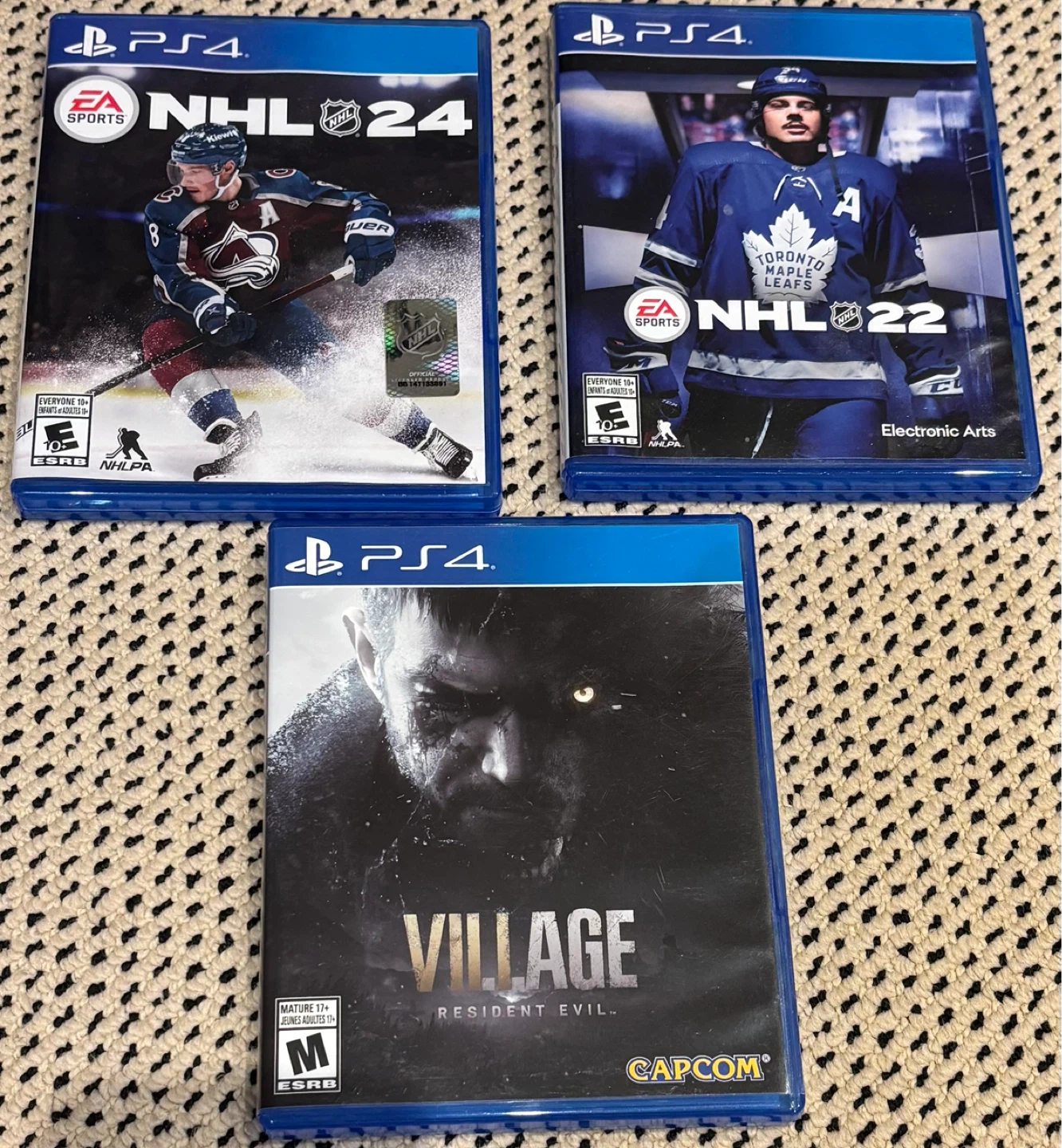 PS4 NHL 24, NHL 22, and Resident Evil Village Games