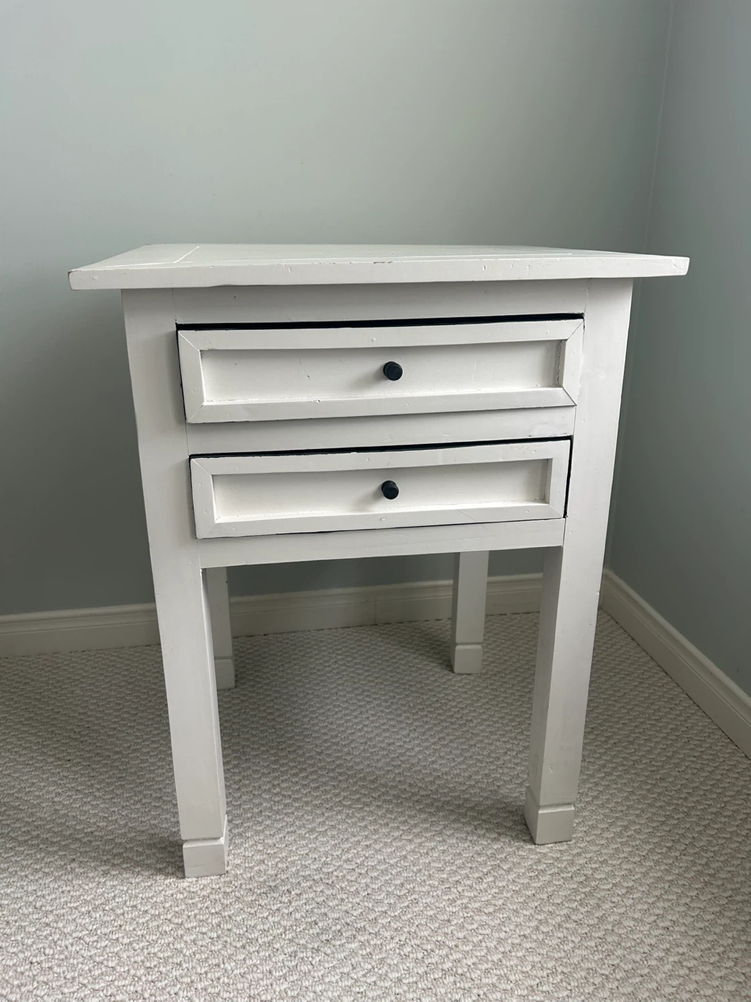 White two-drawer side table