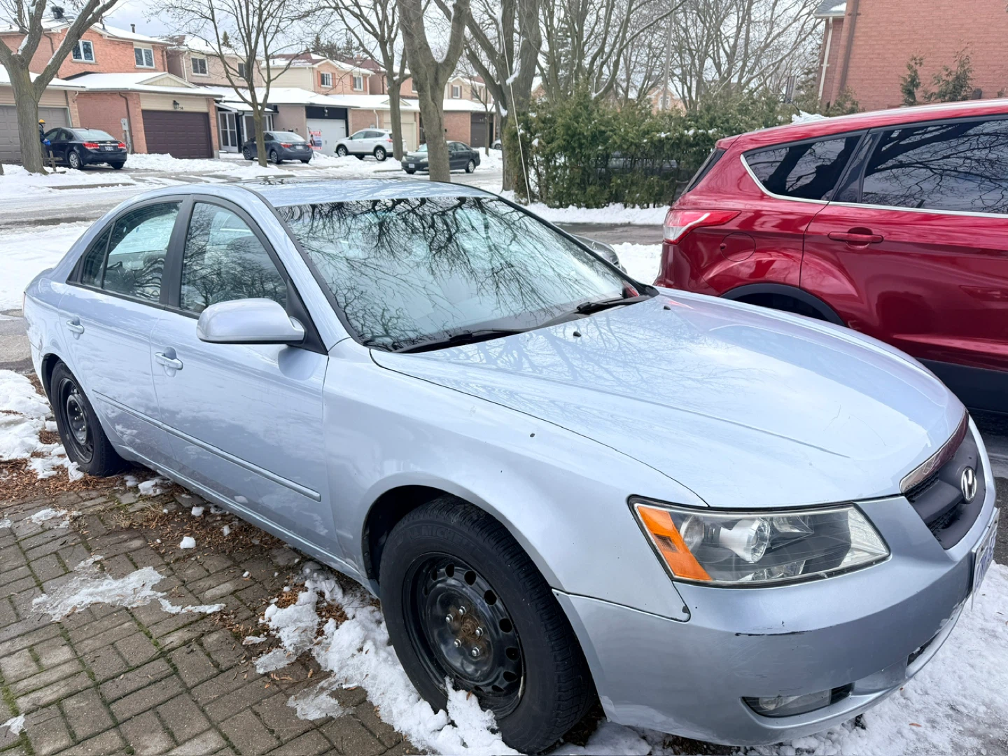 Light Blue Hyundai Sonata Sedan