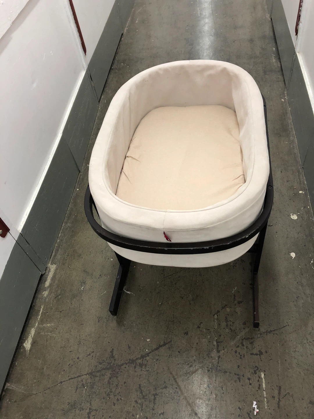 White Bassinet with Dark Wood Stand