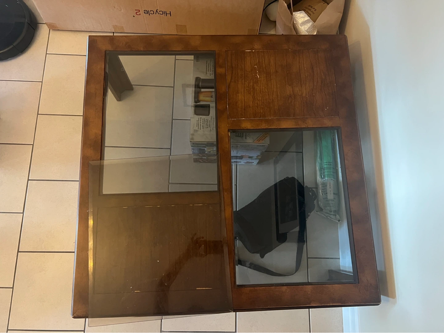 Wooden coffee table with glass inserts