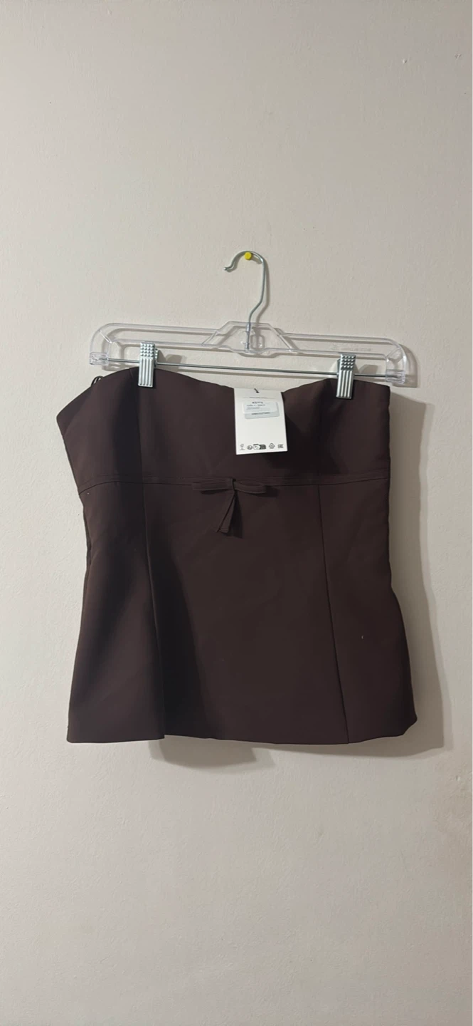 Brown strapless top with bow detail