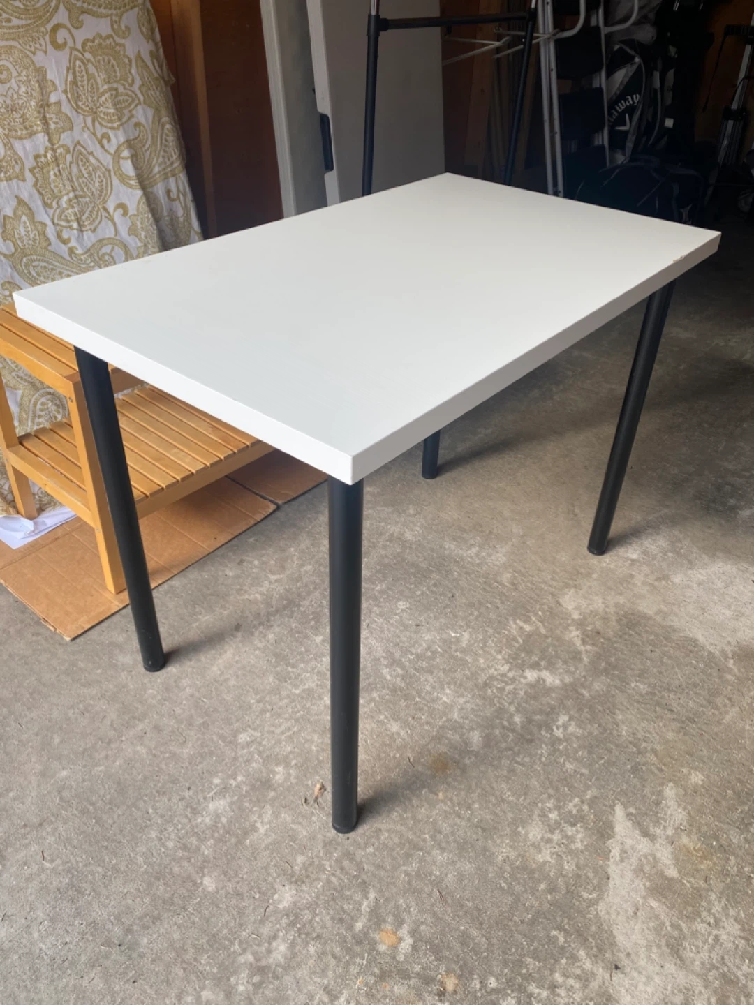 White Table with Black Legs