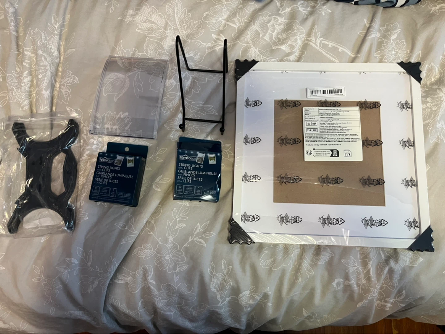 String lights, picture frame, frame stand & cord keeper