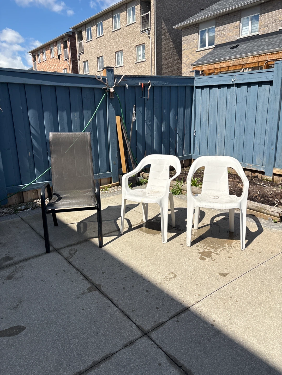 2 White Plastic Patio Chairs