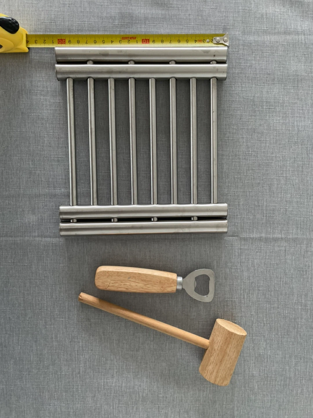 Trivet, beer bottle opener, meat tenderizer hammer