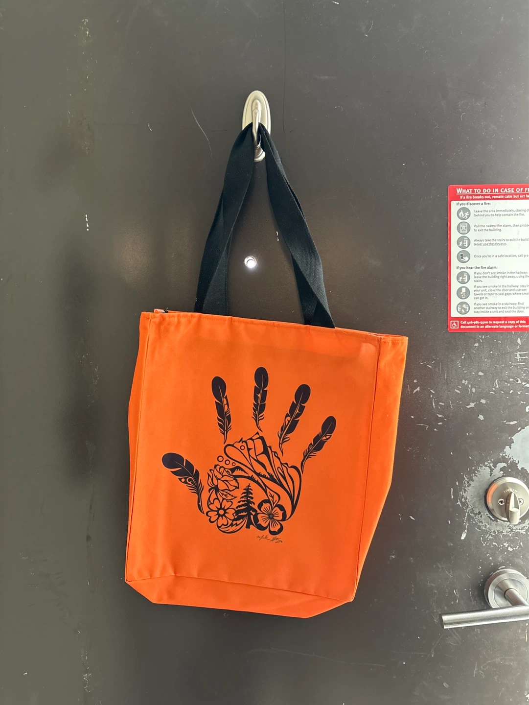 Orange Tote Bag with Hand and Feather Design - photo 2