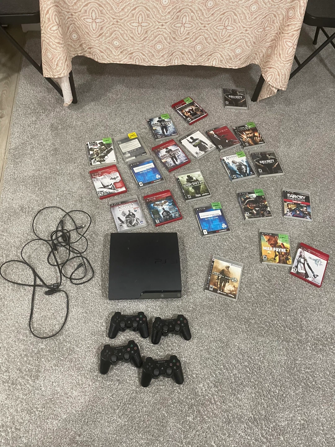 PlayStation 3 Console with Games and Controllers