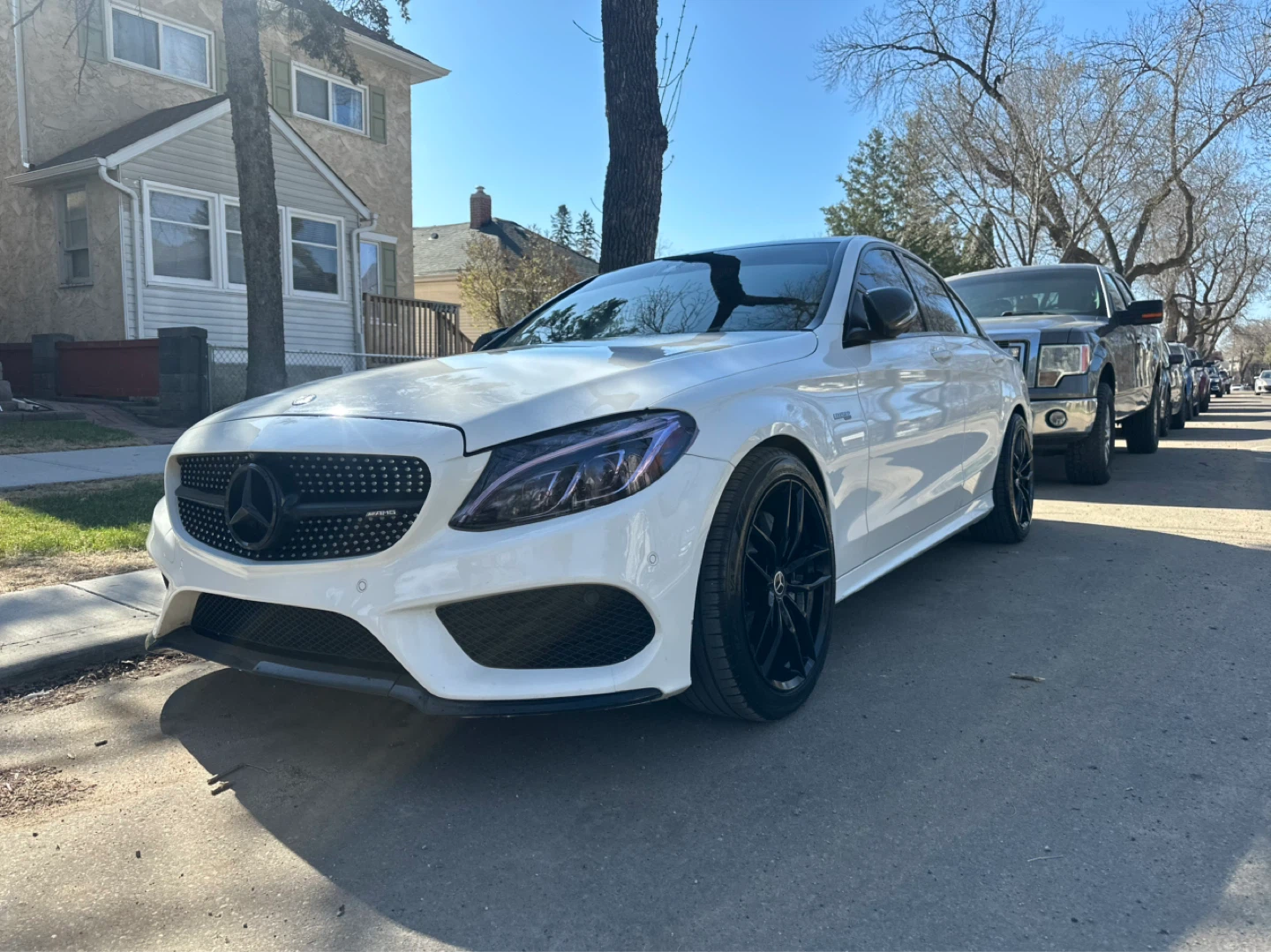 White Mercedes-Benz C-Class AMG Sedan