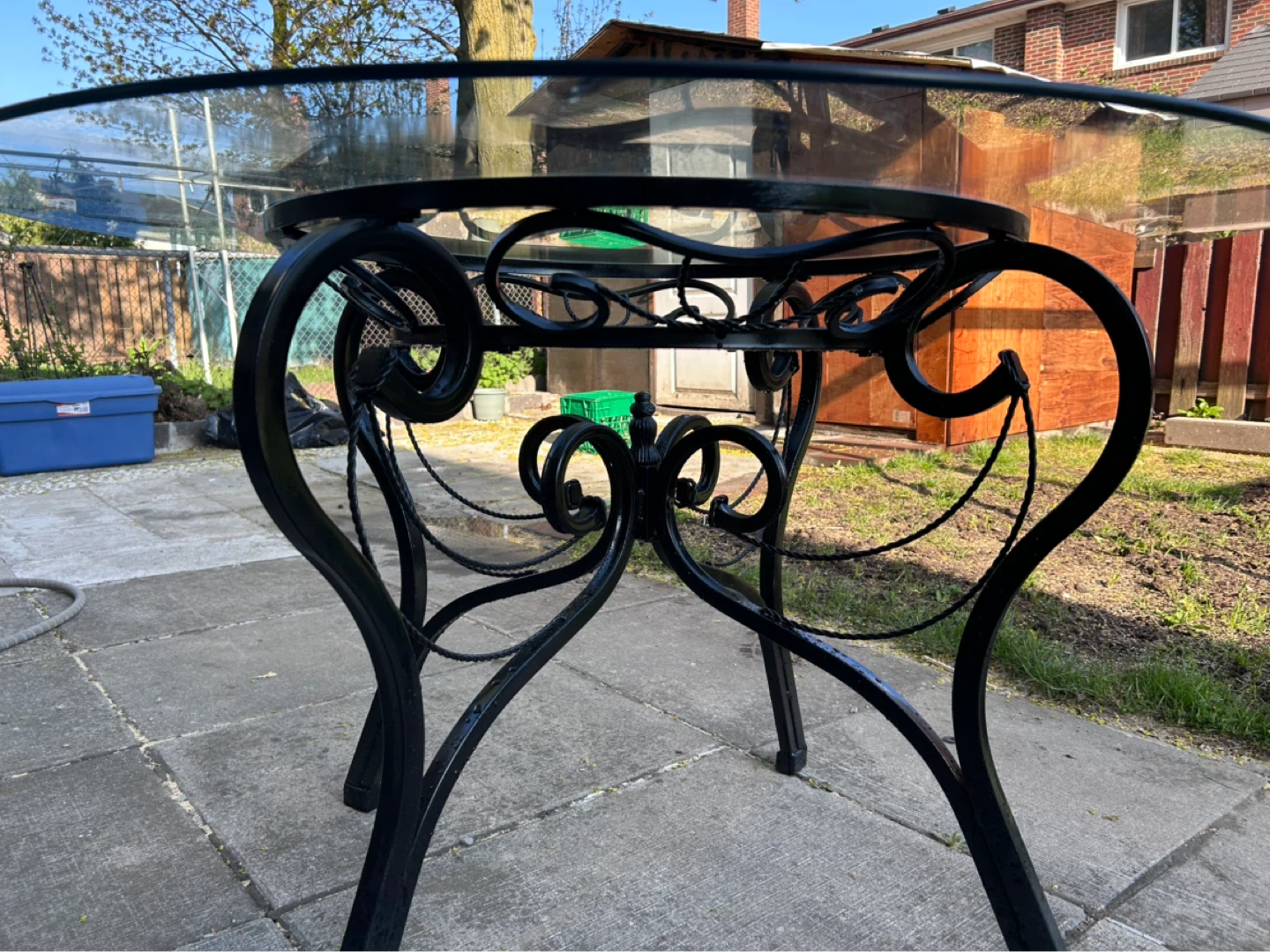 Round Glass Top Table with Ornate Black Metal Base - photo 4