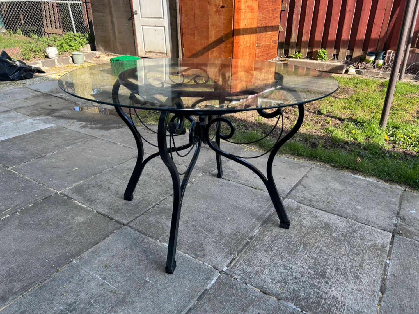 Round Glass Top Table with Ornate Black Metal Base - photo 2