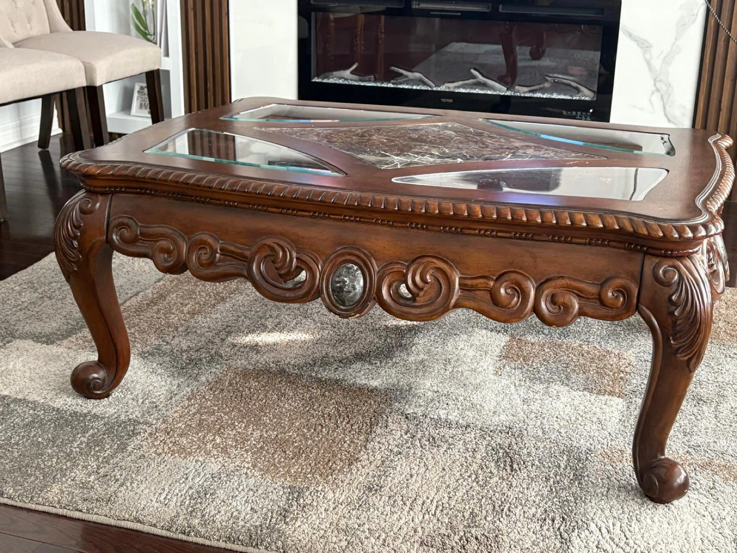 Ornate Wood Coffee Table with Glass and Marble Inlays