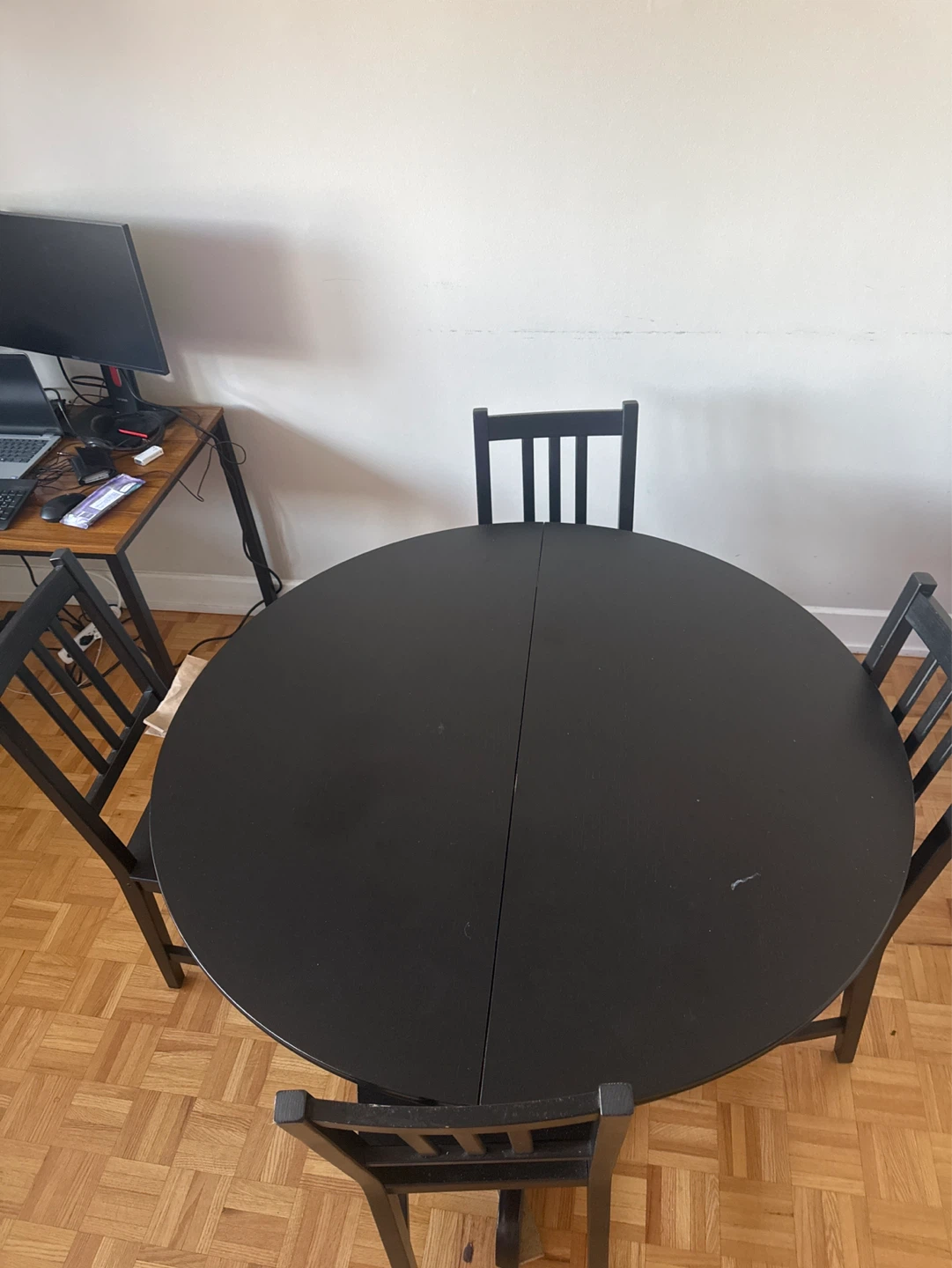 Black Round Extendable Dining Table with 4 Chairs