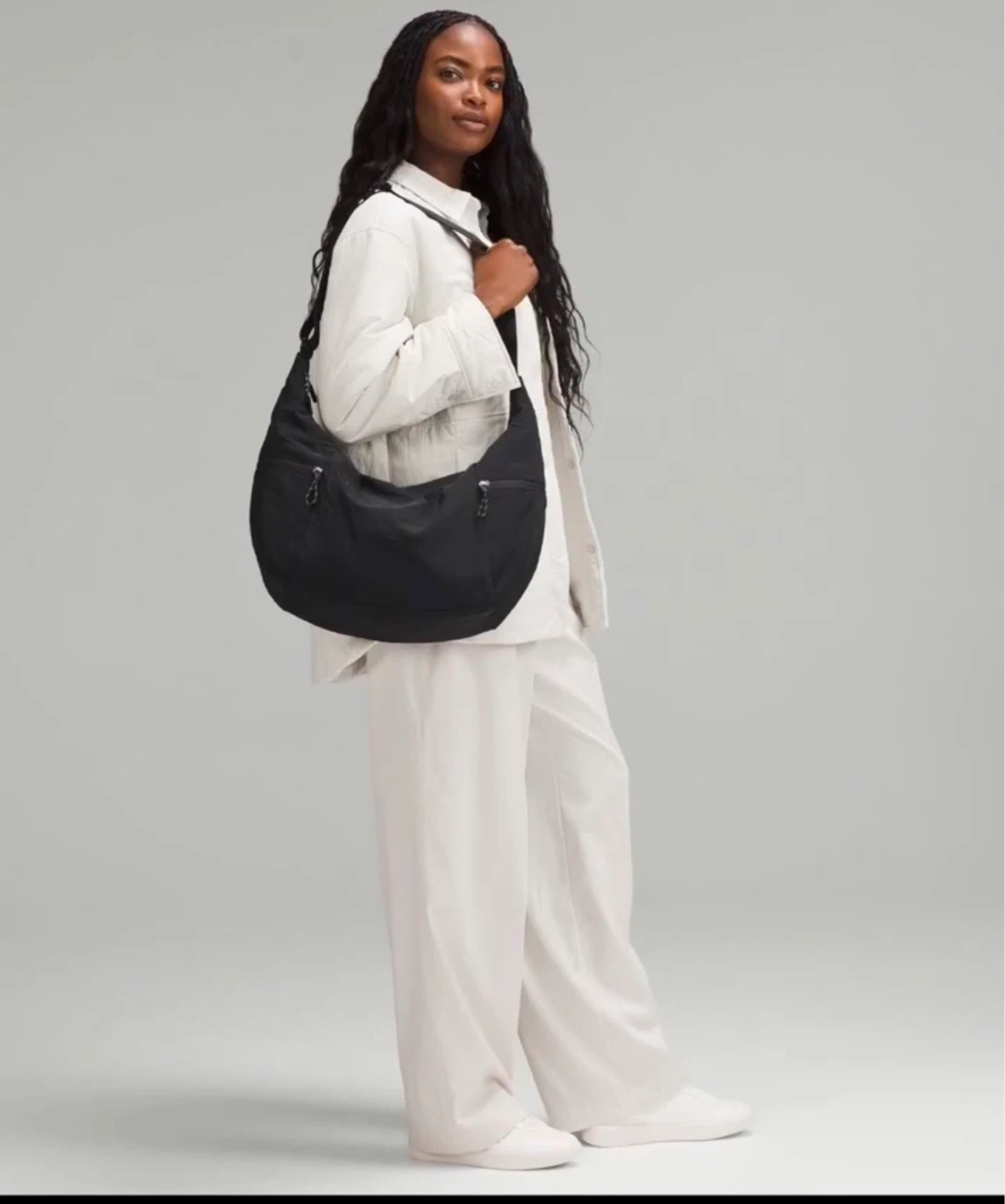 Lululemon Black slouchy sling bag 13L