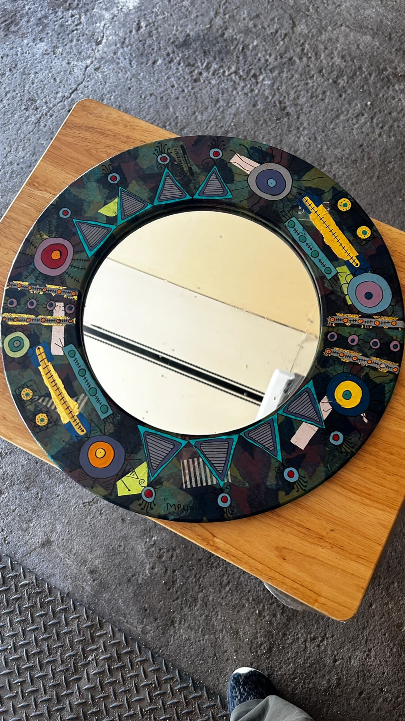 Round Decorative Wall Mirror with Abstract Design