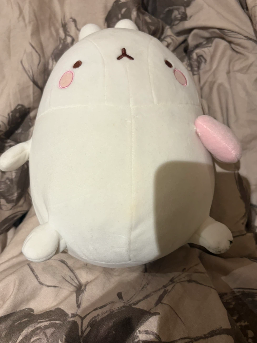 white Aurora World Molang plush