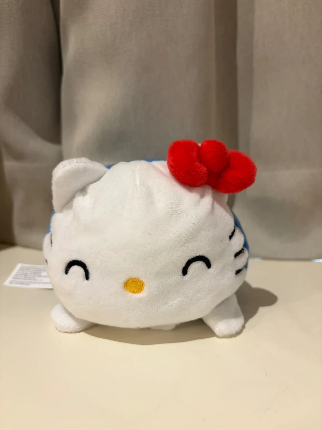 Reversible Hello Kitty plushie