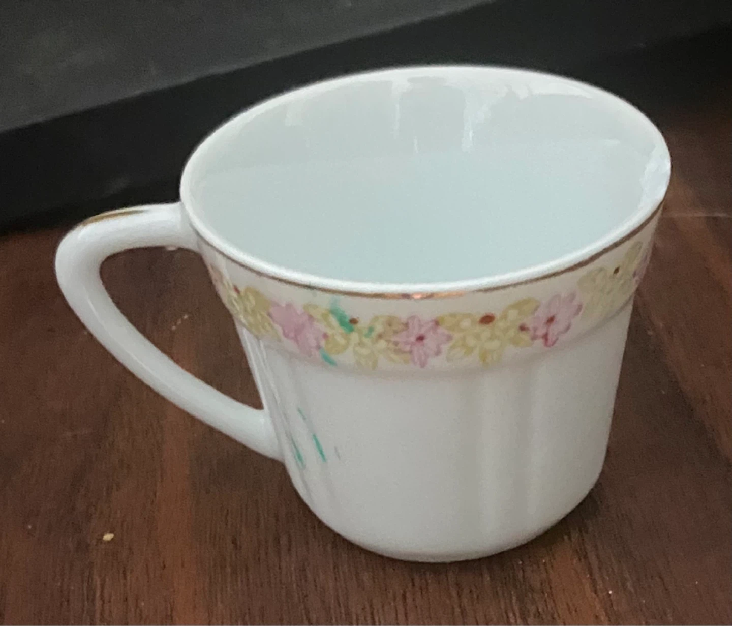 White Teacup with Floral Design