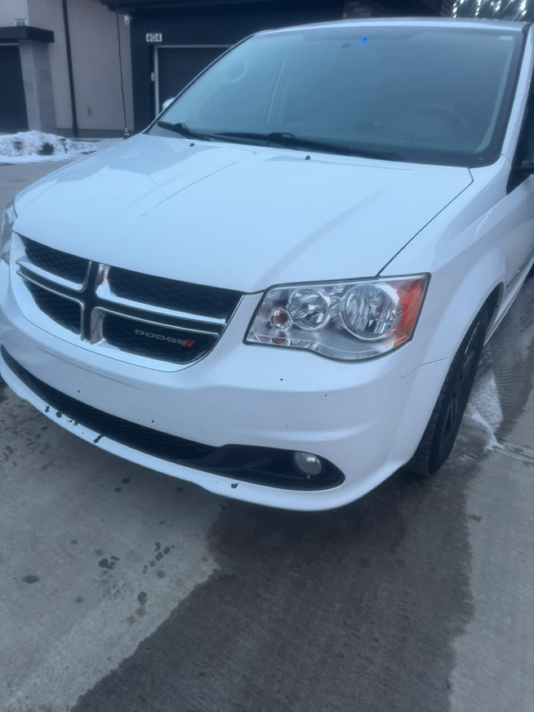 White Dodge Grand Caravan