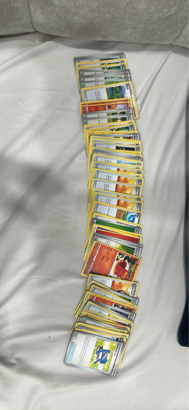 70 Assorted Pokemon Trading Cards for sale