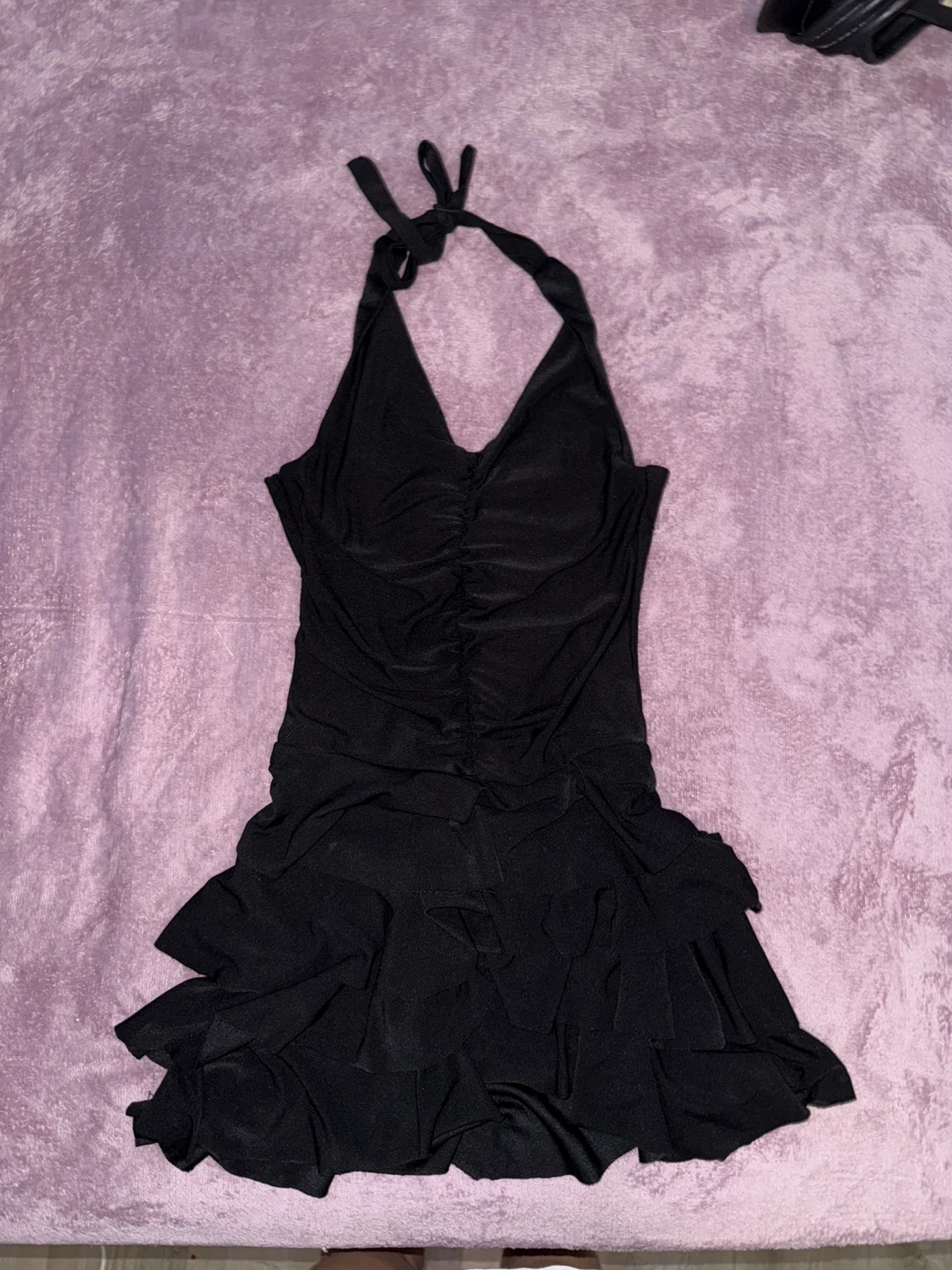 Black halter very mini dress with ruffles