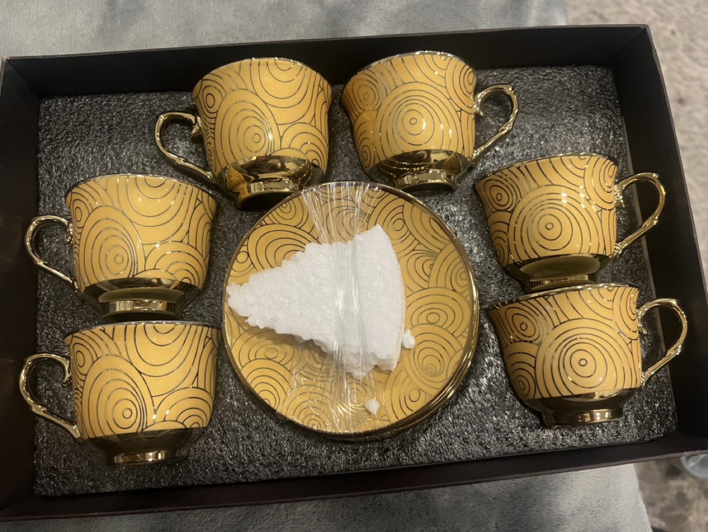 Set of 6 small Yellow Teacups and Saucers