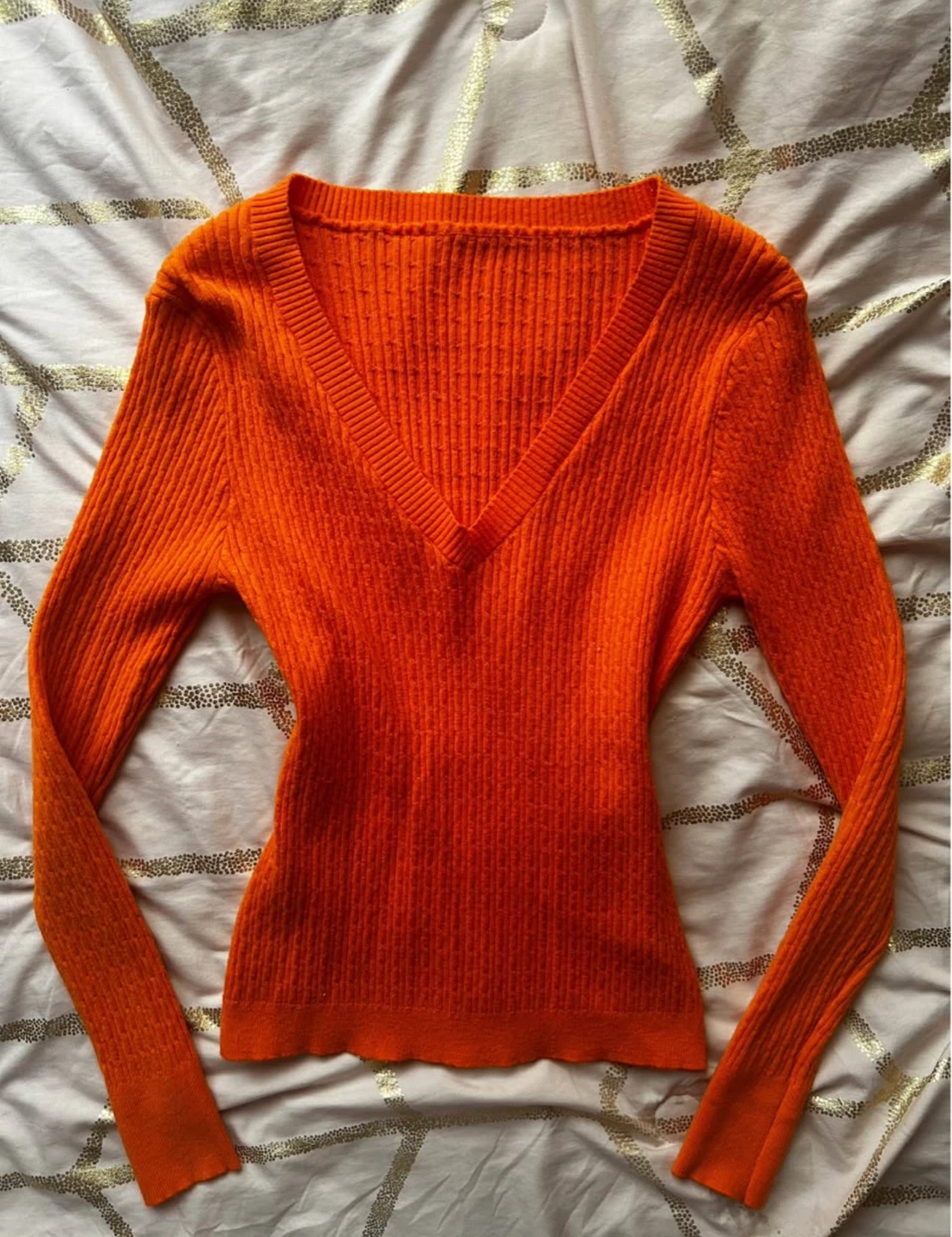 orange knit sweater